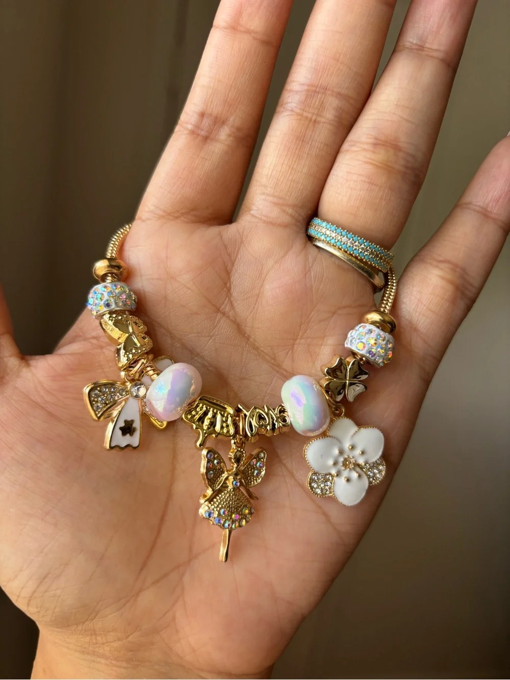 Gold Charm Bracelet with Iridescent Beads and Fairy Charms 🌸